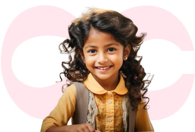 Young girl with curly hair, smiling brightly at the camera.