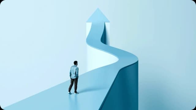 Man on a curving blue path turning into an upward arrow, symbolizing progress and direction.